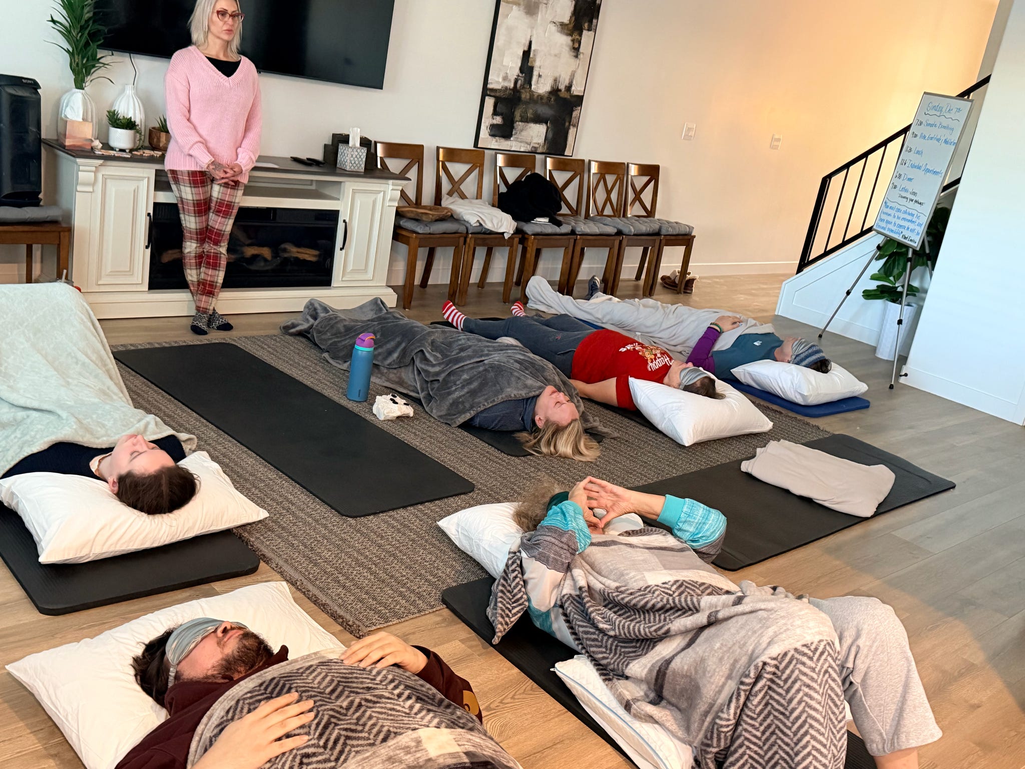 A guest in a somatic breathwork session during the 21-day mental health retreat at The Bridge