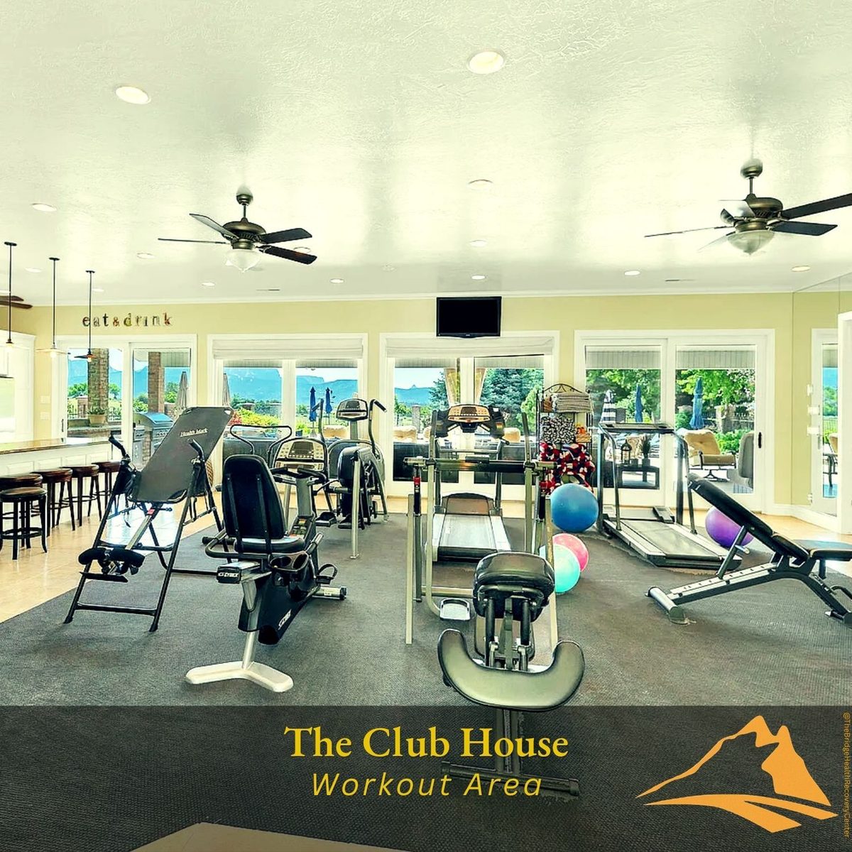 Full fitness center with cardio and weights — The Bridge Club House