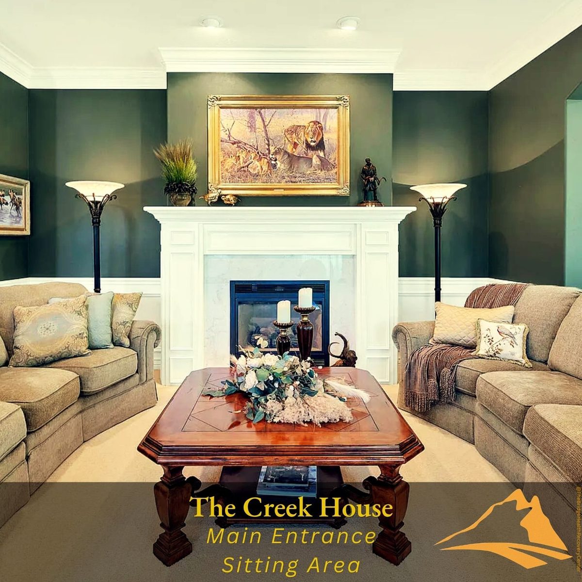 Sitting area with fireplace — Creek House common area